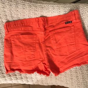 Lucky Brand denim shorts in a coral color